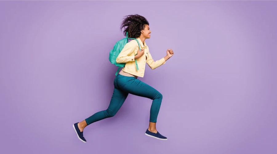 Girl Running with Rucksack